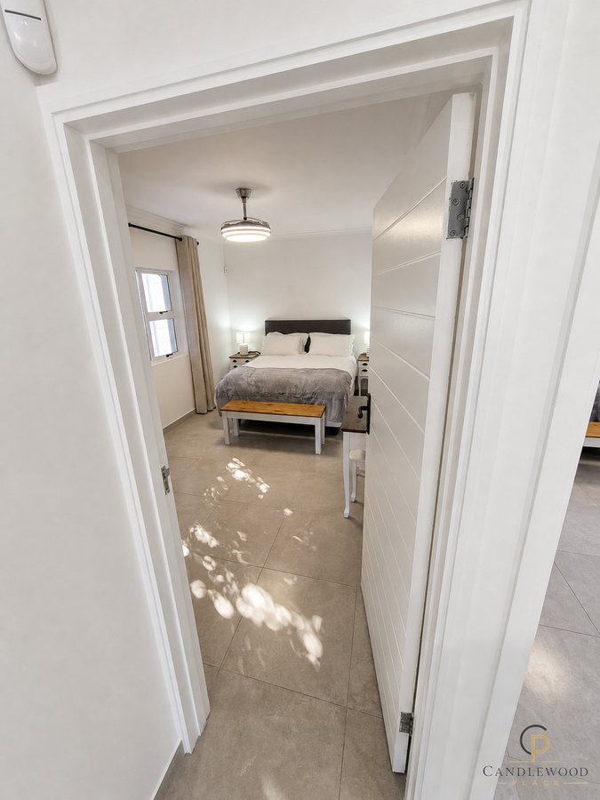 Bedroom one seen from the passage doorway