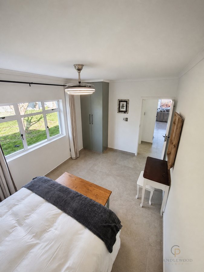Bedroom two with a window onto the garden