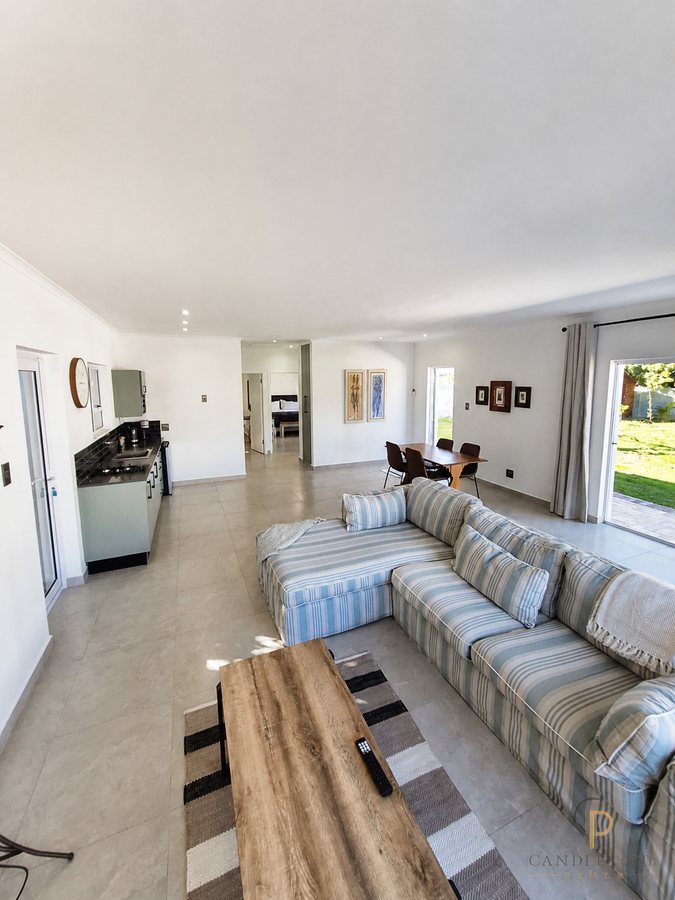 Lounge with sliding doors opening onto the private garden
